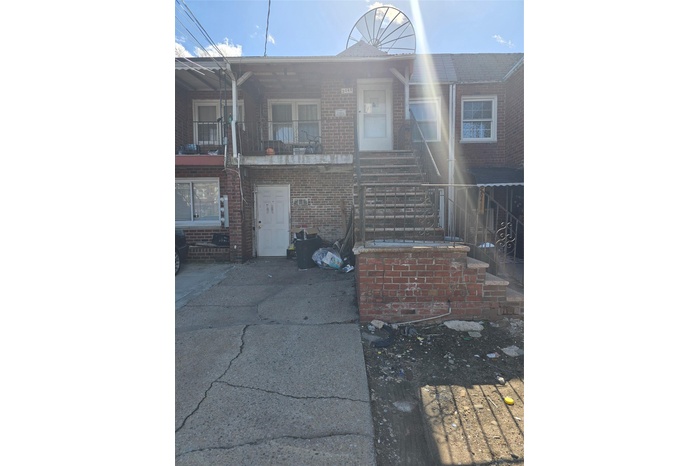 View of front of home with brick siding