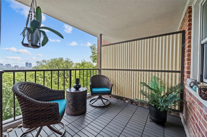 Balcony with open treelined eastern panorama