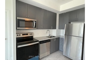 Quiet, bright suite with over 900 sq ft and 9 ft ceilings.