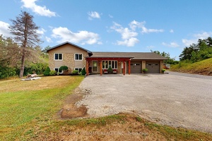 Private 1. 15 Acre Retreat Stylishly Updated amp ; Perfect for Multi Generational Living or a Home Based Business Nestled on a serene, tree lined 1.