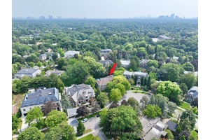 Gorgeous 3 Car Garage Mansion nestled On Prestigious Crescent.