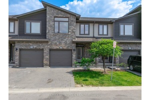 Absolutely stunning 2 storey townhouse with finished basement with 3 piece washroom in the rec room area.