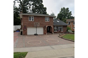 Occupied No Access Investor Opportunity Split level home in the heart of Plainview featuring approx.