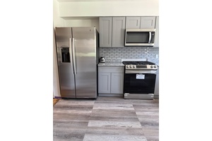 Lovely 3 bedroom 1. 5 bath solid brick home with a private driveway, over sized one car garage.