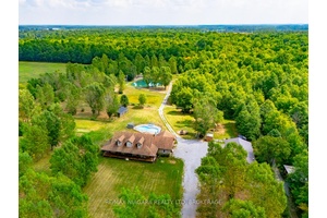 82 Acres of Privacy, Year Round Recreation amp ; Upscale Living !