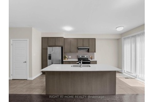 LOCATION ! Open Concept bright and sunny townhouse with 9' ft ceilings main floor spacious bedroom sizes, hardwood floor on main, color changeable LED lighting throw out, Quartz Countertop, SS ...