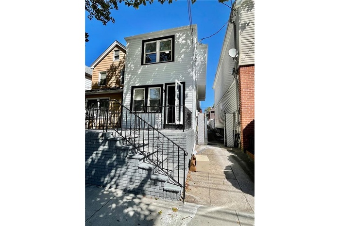 View of front of house with stairway