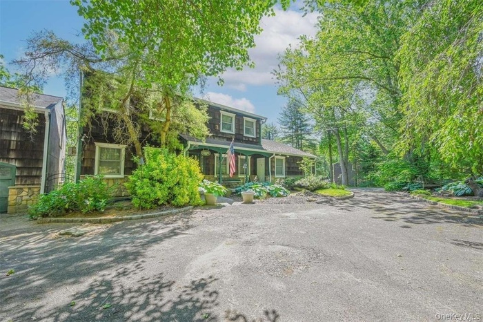 View of front of home with covered porch