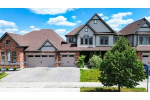 Immaculate Freehold No POTL Fee Townhouse in Desirable Grand River South !