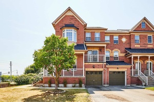 End Unit Townhome with a Welcoming Wrap Around Porch in Woodlands Pickering !