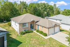 Top 5 Reasons You Will Love This Home 1 Tucked away in a quiet, family friendly neighbourhood, this charming raised bungalow offers a peaceful escape from the rush of everyday ...