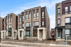 Modern END UNIT Townhouse by Primont Homes.