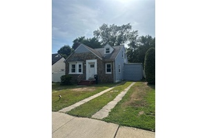 Welcome to this charming Cape style home nestled on a quiet cul de sac, offering timeless character combined with exciting recent upgrades.