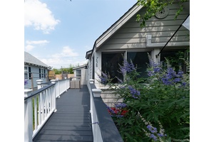 A Cozy and Charming Beachside Home for Families This home is a bright, airy, and meticulously renovated beach house located in the center of Ocean Beach, Fire Island.