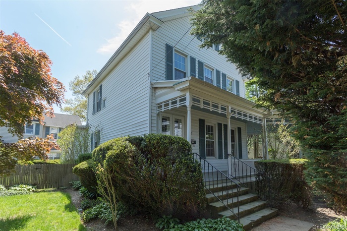 View of front of home with covered porch