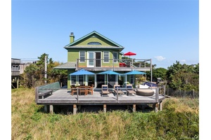 Experience the ultimate oceanfront living with this stunning, updated year round home in Atlantique.
