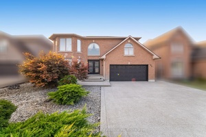 Welcome to 100 National Drive, an exceptional 2 storey residence offering a little under 3400 square feet of beautifully updated living space across the main and second floors.
