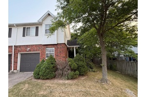 This bright and modern, fully furnished corner end unit townhouse offers approximately 1, 500 sq.