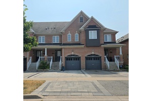 Well maintained freehold townhome in sought after Blue Grass Meadows community.
