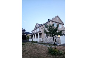 Welcome to this stunning end unit townhome with a 2 car garage, tucked away on a quiet dead end street in the sought after Stonebridge community.