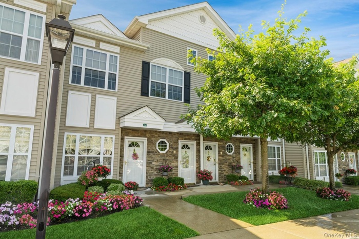 View of front of house featuring stone siding