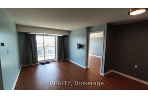 Sun splashed, south facing suite with balcony access from every room and an unobstructed city vista.