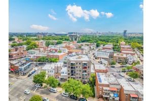 Bright and spacious 2 bedroom, 2 bath condo on the 3rd floor of a well maintained elevator building in the heart of Corona.