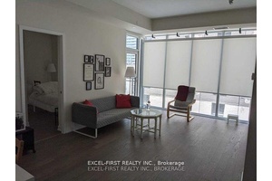 Totem Condominiums Located In The Heart Of Downtown Toronto.