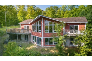 Built 20 years ago, this year round cottage or home sits on a treed 4.