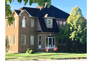 Exceptionally bright corner detached home with double garages in the heart of Richmond Hill, featuring extra large windows with beautiful park views.