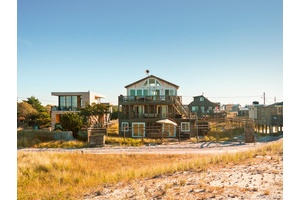 Nestled along the serene coastline, this remarkable property for sale in Robbins Rest offers a harmonious blend of natural beauty and modern luxury.