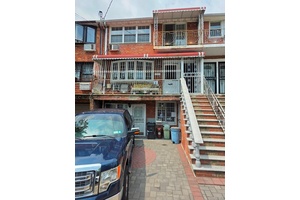 Brick 2 family 4 story basement plus 3 floors.