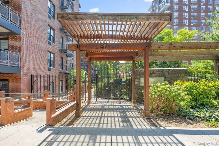 View of property's community featuring a pergola