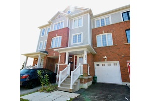 Beautifully Maintained East Facing Entrance Freehold Townhome No Fees in Prime Location !