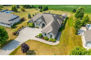 Welcome to 96 Heather Lynn Blvd in Tara A stunning all stone bungalow that combines luxury with exceptional functionality.