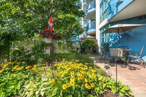 RARE GARDEN SUITE AT 'THE YACHT CLUB' Your Own Private Oasis by the Lake !