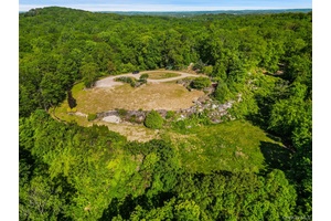 A rare and exceptional opportunity to build your dream home, with distant views, on 33 private acres.