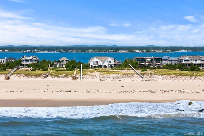 Bird's eye view of waterfront with a beach
