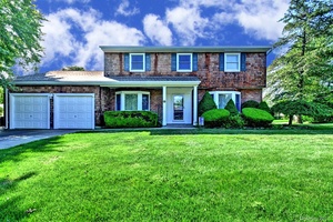 10 Laurel Road Oakdale, NY 11769 Well maintained colonial features a new roof with 4 bedrooms 2.