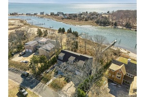 Welcome to 2280 Deep Hole Drive, a boater s paradise, 2 story, 3, 000 sq ft low maintenance retreat home built in 2022.