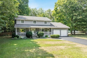 Top 5 Reasons You Will Love This Home 1 Step into a radiant and generously proportioned home where rich hardwood and elegant ceramic flooring seamlessly guide you through an open ...