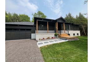 Step into an unparalleled blend of elegance and natural beauty with this brand new custom built raised bungalow, designed to provide a sanctuary for nature enthusiasts and luxury seekers alike.