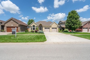 Dwyers have built a stunning all brick ranch home in Strathroy's prestigious area, offering 4 bedrooms and 3 bathrooms.