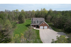 Welcome to 323237 Durham Road E, West Grey Nestled on a beautifully maintained 4 acre lot, this stunning home is located only minutes from the town of Durham.
