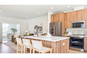 Nestled within The Ridge Townhomes community, the Caufield residence offers a luxurious and spacious living experience.