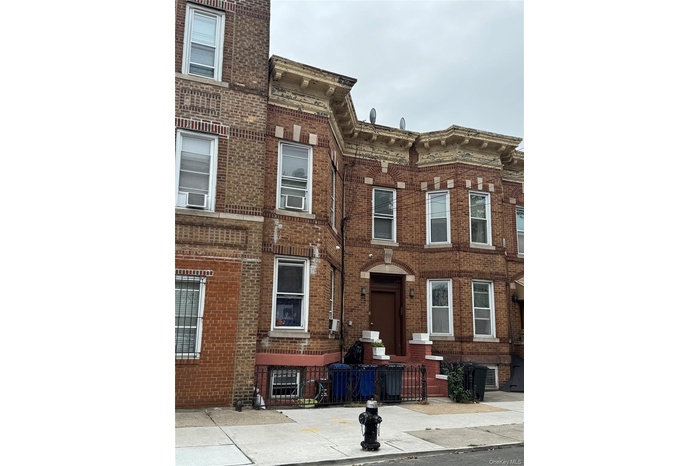 View of front of home with brick siding