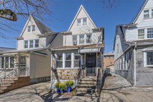 Charming Colonial in the Heart of Queens Village.