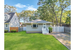Charming and fully detached single family ranch home nestled on a spacious lot in the heart of Mastic.