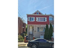 Discover a fantastic opportunity with this legal three family home, perfectly situated in a highly sought after neighborhood.