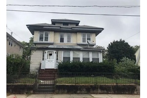Nestled in a prime area, this beautiful two family house offers an exceptional living experience with its spacious layout and modern amenities.